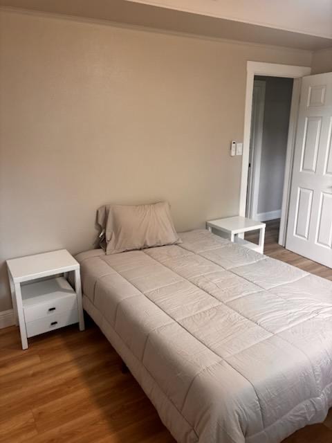 Bedroom with bed and nightstand