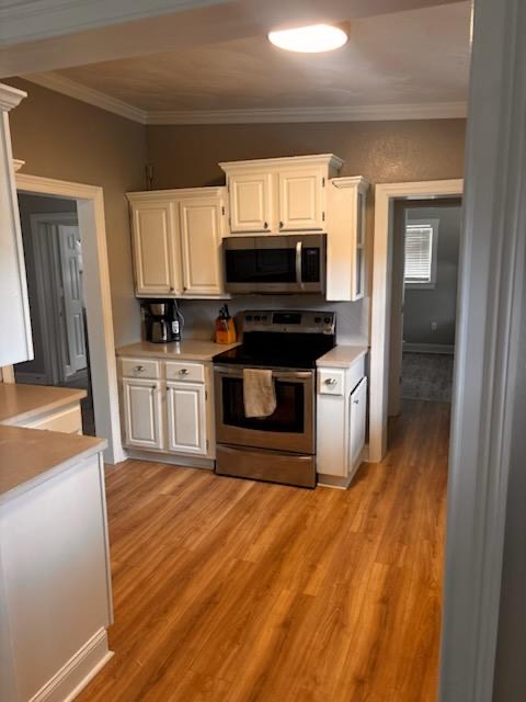 Fully equipped kitchen with stainless steel range